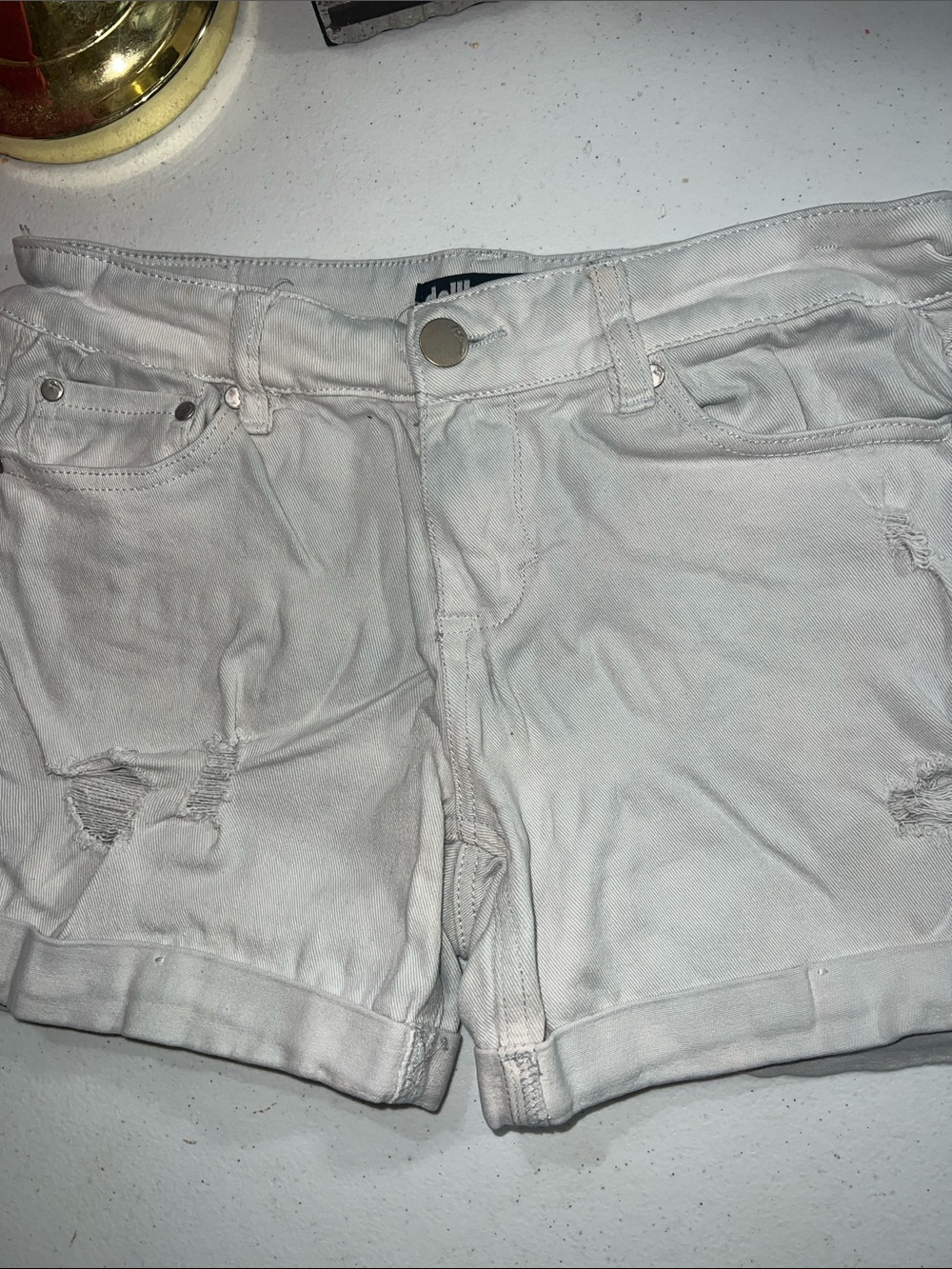 Dollhouse "Dylan" white Boyfriend Cuffed denim shorts.